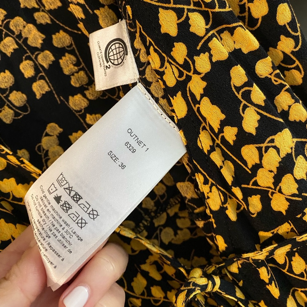 Ganni Dexter Goldstone Black and Gold Floral Midi Wrap Dress with Flared Skirt - Picture 4 of 9